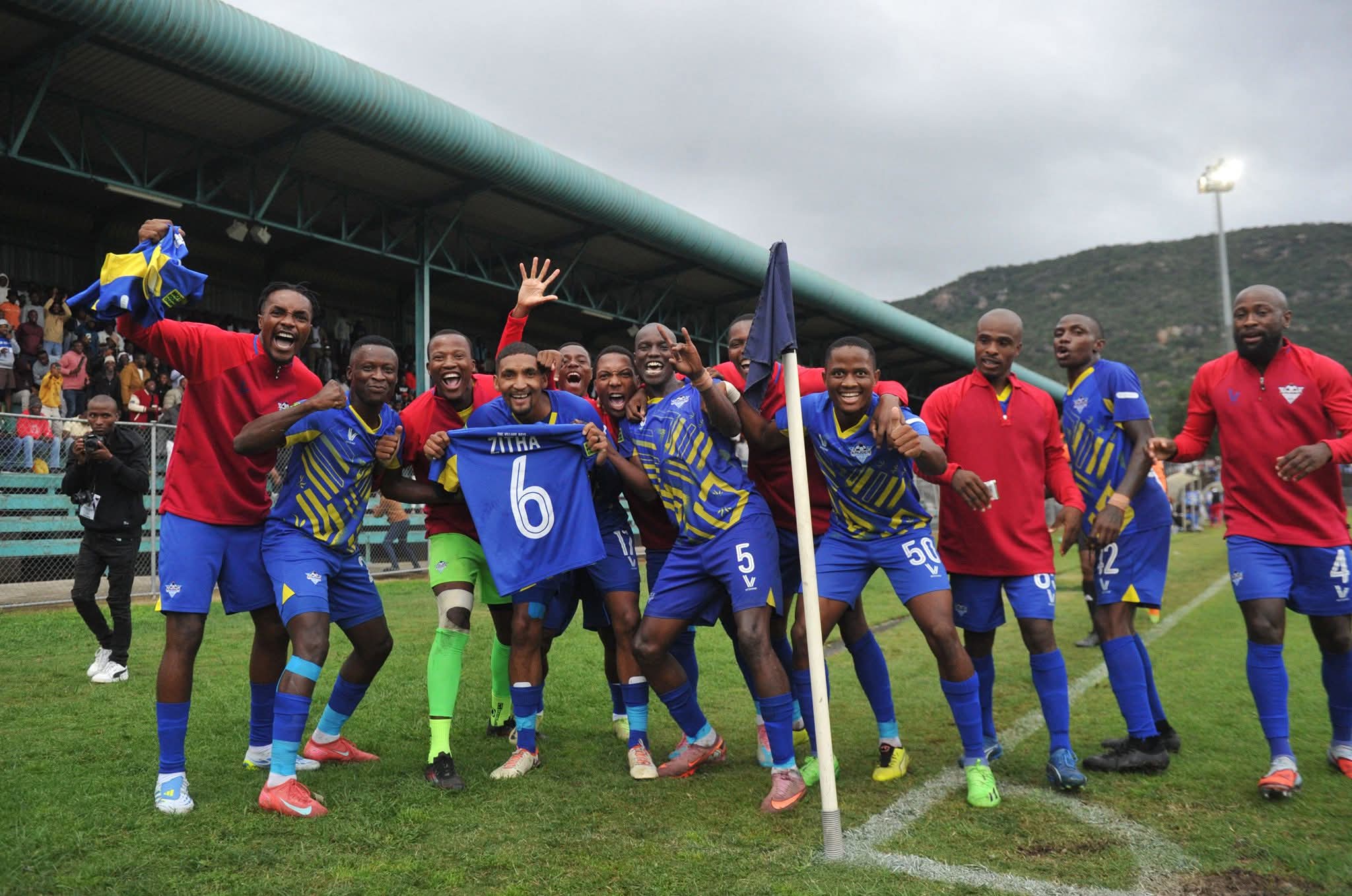Kruger United players celebrate a goal during a League match