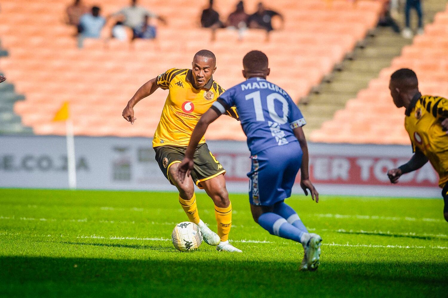 Kaizer Chiefs midfielder Lebohang Maboe dribbles the ball past TS Galacy captain Siphesihle Maduna