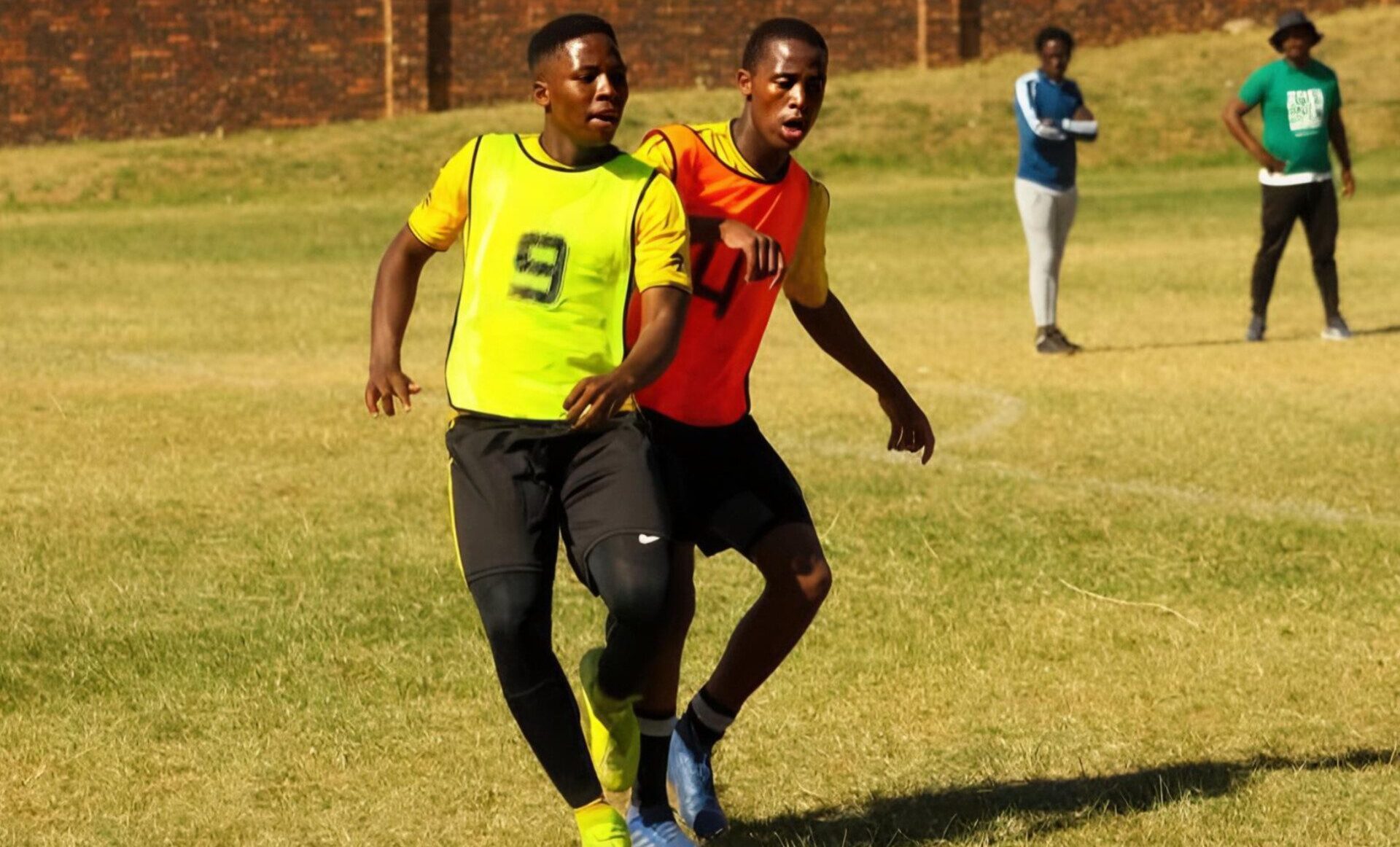 Lebane Seema (right) in action during his early development days before his rise to professional football.