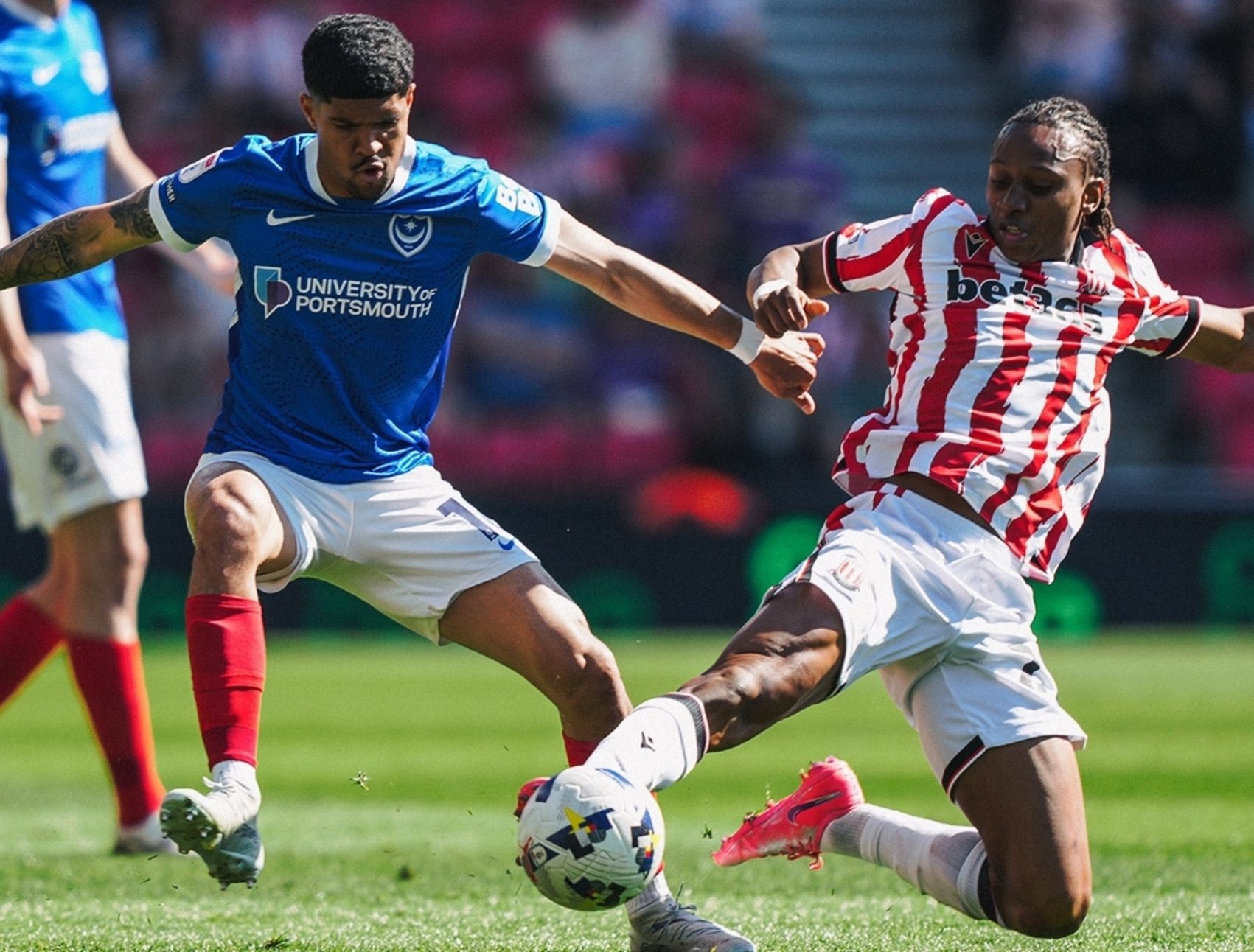 Luke Le Roux in action for Portsmouth FC against Stoke City