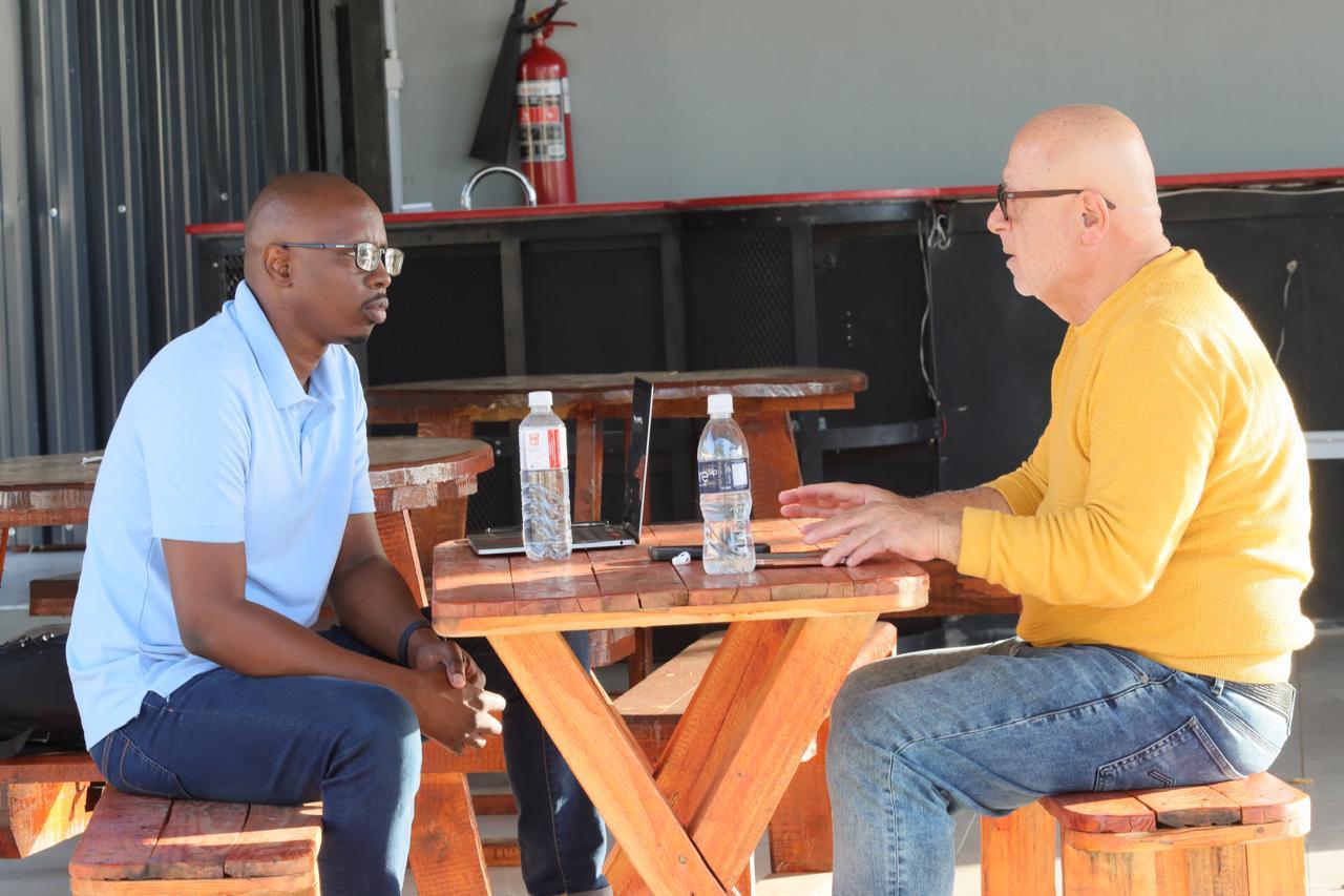 Mthokozisi Dube with GU boss Nicolas Zakhem