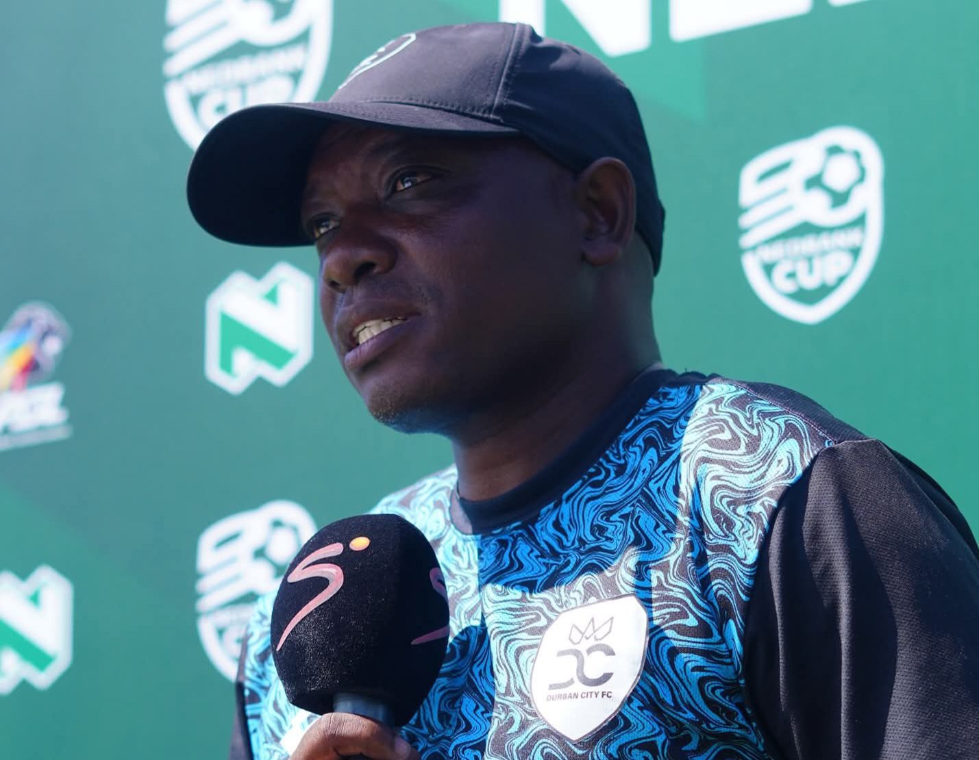 Pitso Dladla talking to the SuperSport TV before a Nedbank Cup match.