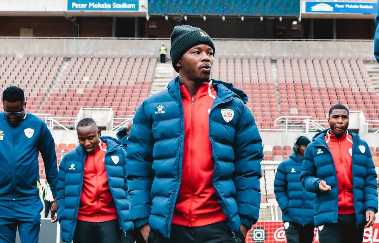 Sekhukhune United players are doing a pitch inspection before a League match