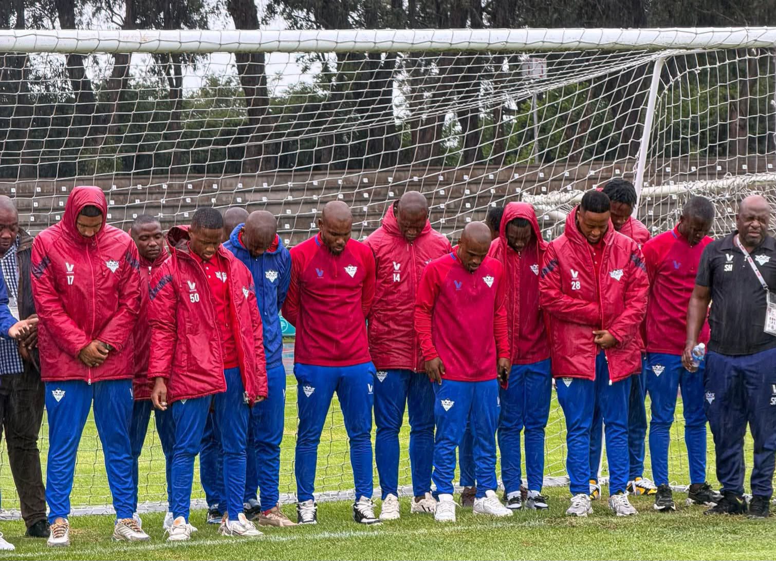 Tercious Malepe standing with his Kruger United teammates before a match.