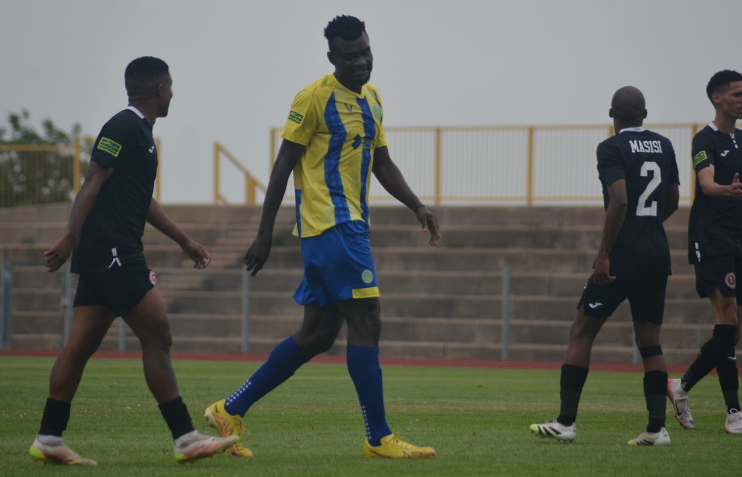 Cameroonian striker Fils Ndou Moukete Simon Ngoh in action