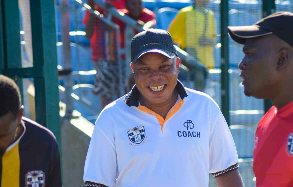 Joel Masutha sharing a joke before the match against Kruger United at Kanyamazane Stadium.