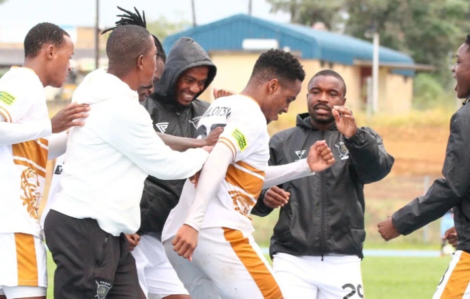 Ntuthuko Mlotshwa in celebratory mood with his Lerumo Lions FC teammates