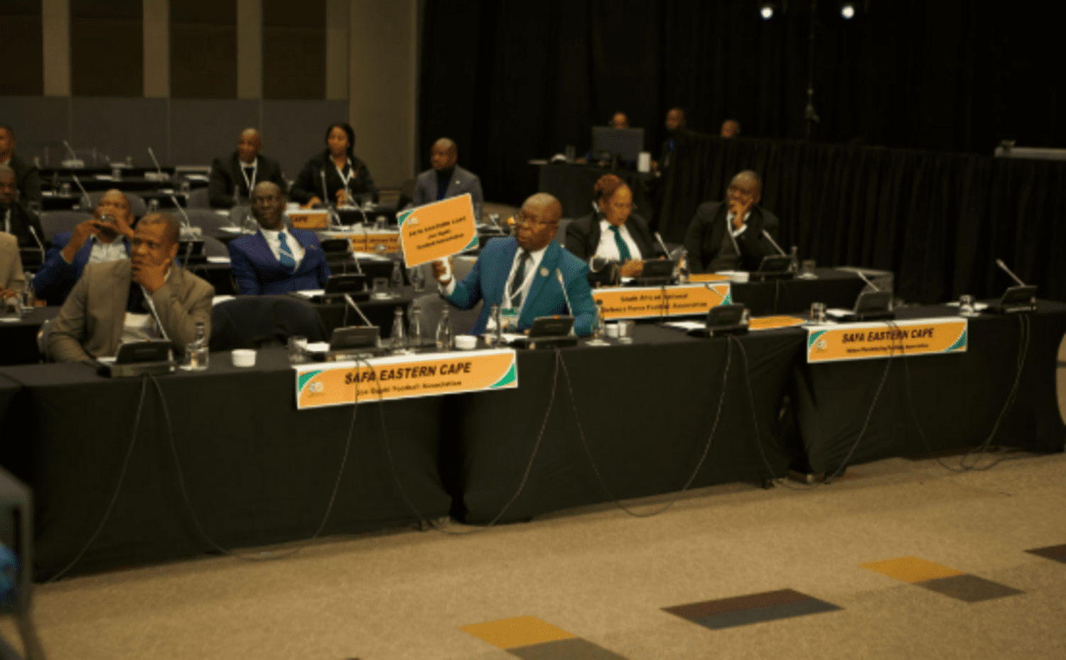 SAFA delegates participate in a meeting