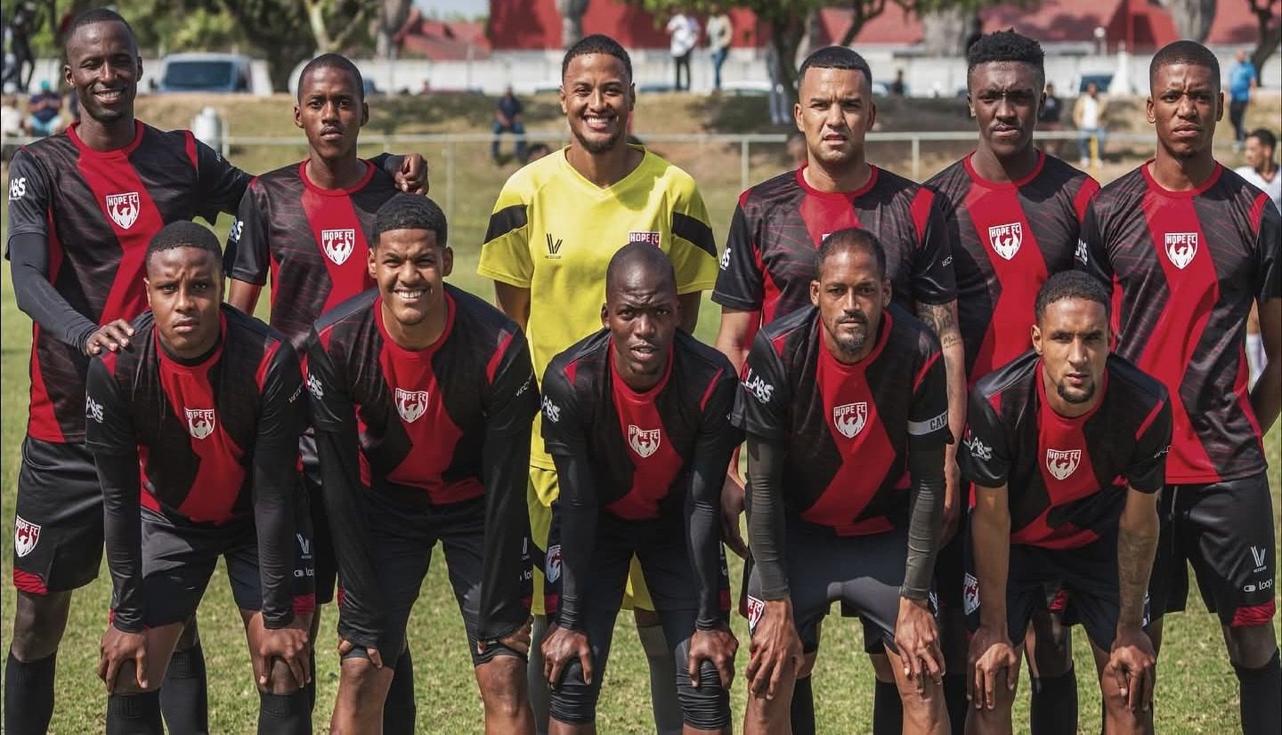 Craig Martin with his Hope FC teammates